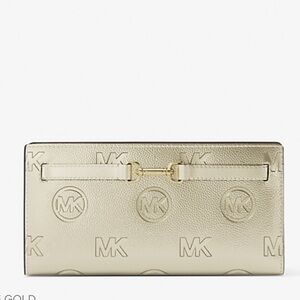 MICHAEL KORS Carson Lg Metallic Logo Debossed Snap Bifold Wallet
Pale Gold 
NWT